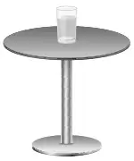 A glass of water standing on a small round table