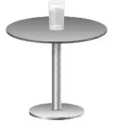 A glass of water on a small round table