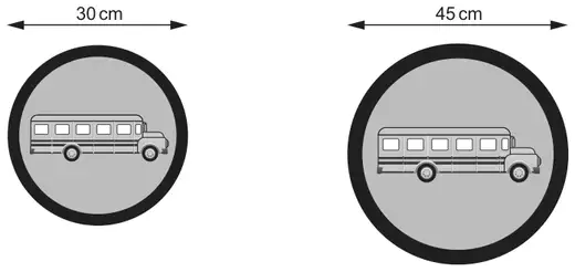 Two similar circular road signs showing a bus; the smaller is 30 cm across, the larger 45 cm across