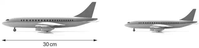 Photographs of a large and a small toy plane; the length of the large plane is marked 30 cm