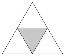 The same triangle divided into 4 equal triangles, the middle one shaded